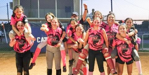 The Tornado Twisters finish an undefeated season (14-0), earning championship hardware at the Childress Little League Home Run Derby on Sunday, May 17. From left: Paisley Egerton, Kyleigh Garrison, Allison LaCario, Zoey Thrash, Coach Randy Arnn, Oaklynn Fuller, Teagan Britten, Virginia Meade, Raynee Arnn, Coach Vanessa Arnn, Robyn Torres, Paisley Jackson. COURTESY PHOTO