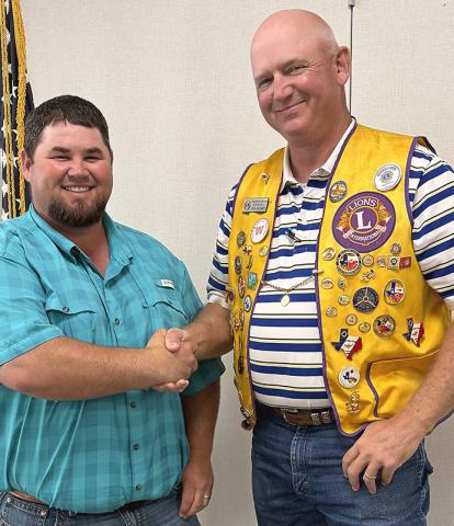 Wellington Boss Lion Rex Henard, right, expresses appreciation to Collingsworth County AgriLife Extension Agent Kenny Patterson for sharing his knowledge during the Monday, Aug. 17 meeting of Wellington Lions Club. Patterson mentioned that trees are in dire need of a deep watering system due to the ongoing drought. INTREPID PHOTO / BEV ODOM