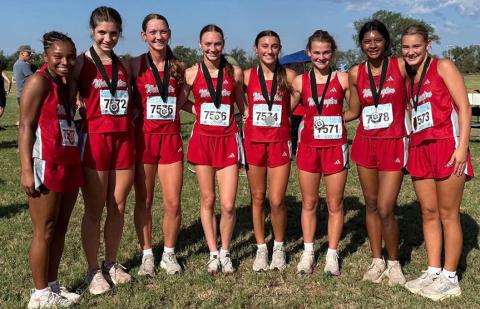 The Lady Rocket cross country team brought home the title on Saturday, Sept. 26, from the Third Annual Hollis Tigers Cross Country Meet at the Hollis Golf Course. All eight Lady Rocket runners medaled, including Aleah Lewis, Anna Henard, Kaesyn Kane, Taytum Kane, Claire Kane, Halle Hedrick, Priscilla Marentes, and Ava Kate Inman. WELLINGTON HIGH SCHOOL