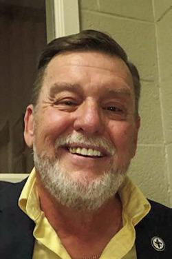 JOHN R. BALLEW