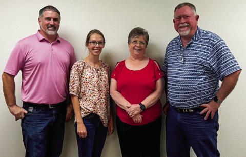 Collingsworth Farm Bureau Insurance staff congratulates Saunda James on her 18 years of dedicated service. From left, Brandon Ward, Sierra Hartman, James, Durk Green. The Red River Sun/Shauna Salinas