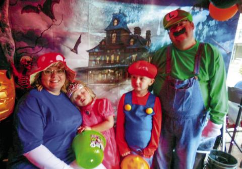 Matt Nix, dressed as Luigi, wins the adult male category in the Memphis Chamber of Commerce Halloween Costume Contest Saturday, Oct. 28, earning $50. “It was so very hard for our board to pick,” Memphis Chamber of Commerce Manager Kim Cloyd said. “We thank you all for the fun and for entering our contest.” Photos by Memphis Chamber of Commerce