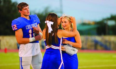 Childress senior Kate Taylor, accompanied by escort Seth Taylor, is crowned the 2022 Childress High School Homecoming Queen during halftime at the Childress vs. Breckenridge game Friday, Sept. 2 at Fair Park Stadium. Photos by Childress High School Yearbook Staff