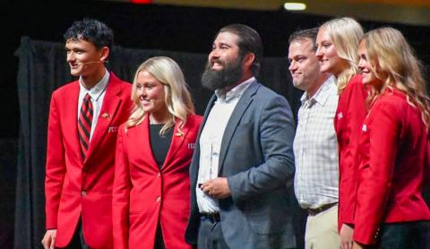 Childress High School Family, Career and Community Leaders of America (FCCLA) Adviser Jeffrey Collins, center, is awarded the Safe Roads Challenge Adviser Model of Excellence in Traffic Safety Award at the FCCLA National Leadership Conference Opening Session in Washington, D.C. CHILDRESS FCCLA