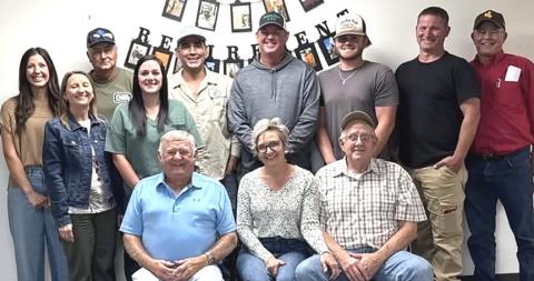 Danny Gray (front left) with his fellow GreenLight Gas staff members. COURTESY PHOTO
