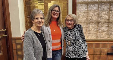 Modern Home Club hostesses Margie Porter, left, and Pat Collins, right, welcome guest speaker Nicole Tyler, Childress District of the Texas Department of Transportation (Tx-DOT) Traffic Safety Specialist, Thursday, Nov. 20 at the Childress County Heritage Museum Courtesy Photo