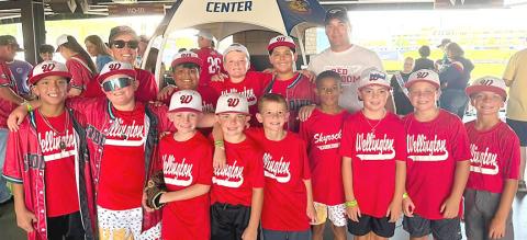 Front, left: Leo Nunez, Landry Mixon, Braxton Sims, Max Orr, Gus Shots, Xander Periera , Luke Roberson, Stratton Wynn, Ezra Peters. Back, left: Coach Marcie Orr, Layton Wynn, Kacen Wiebe, Zackery Nunez, Coach Matt Wynn. COURTESY PHOTO/NATASHA MIXON