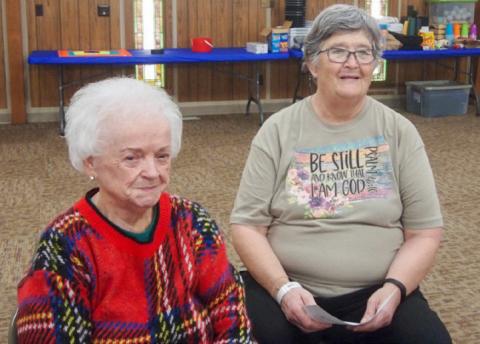Linda Rothwell, left, plays “Nativity Story Left, Right,” led by Sabrina Landrum, at the monthly Adult Fellowship Luncheon Thursday, Dec. 14 at the Childress Methodist Church Fellowship Hall. Landrum’s program for the season featured a Christmas quiz and information about the carol “The Twelve Days of Christmas.” Photo by Grace Holman