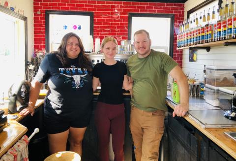 Co-founder Kassidy Barlow, left, barista Alyvia Sorensen and co-founder David Sorensen supervise the Sorensen Wellhouse coffee truck, a.k.a. The Soggy Llama, located at 309 Houston St., just south of Wellington Fairgrounds, on the west side of U.S. Hwy 83. Not pictured: co-founder Kathryne Sorensen. The Red River Sun/Bev Odom