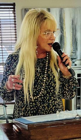 Vocalist Melissa Kiker spent a recent Sunday afternoon singing patriotic and Thanksgiving selections at Wellington Care Center. Courtesy Photo