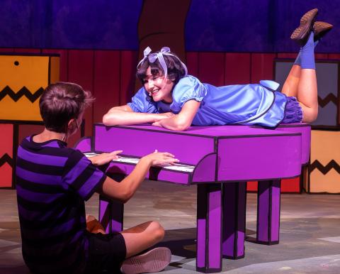 Schroeder and Lucy, portrayed by Atticus Lee and Kennedy Cardenas, embrace an intimate conversation as he performs a tune on his piano during the Amarillo Little Theatre Academy production, “You’re a Good Man, Charlie Brown.” The Wellington Ritz Theatre welcomes the production with a 2 p.m. and 7 p.m. show on Saturday, July 25. For reserved seats, $20 for adults and $12 for students (three and up), call 806-447-0090 or visit wellingtonritztheatre.com. VENICE MINCEY PHOTOGRAPHY