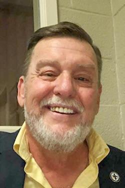 JOHN R. BALLEW