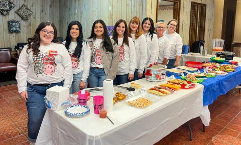 The People’s Federal Credit Union staff greet over 100 guests, many of which were dressed in their holiday best, at the annual Christmas Open House at The People’s Federal Credit Union (FCU) Childress Branch Tuesday, Dec. 12. Photo Courtesy of The People’s Federal Credit Union