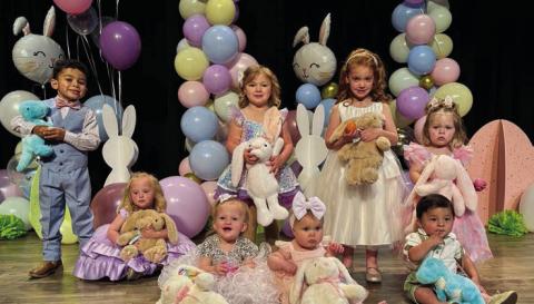 The 2025 Wellington Ritz Theatre crowns two Tiny Tot winners in each of the four age divisions. Front row, from left: Kaydence Mixon, wo-three-year-old; Bristol Brooks and LoRhae Statham, infant-11 months; Lennox Sebastian Kai Cantu, one-year-old. Back row, from left: Augustus Cole Ramirez, four-five-year-old; Kynleigh Dawn Statham, twothree- year-old; Madilyn Gilliam, four-five-year-old; Ava Lyn McCarty, one-year-old. Wellington Ritz Theatre