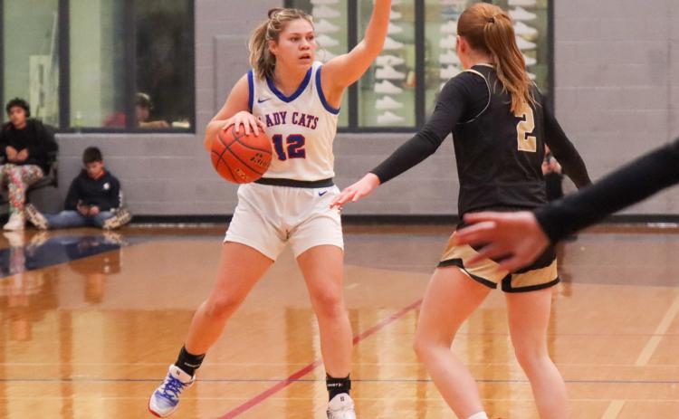 Childress’ Emma Jalomo calls a play during the Lady Cat’s 54-49 loss to the Bushland Lady Falcons Tuesday, Jan. 13 in Childress. Unable to break their losing streak, the Lady Cats also fell to the Dalhart Lady Wolves in a 65-38 heartbreak Friday, Jan. 16 in Dalhart, upping their total to eight consecutive losses. Also in a rough patch, the Childress Bobcats came up short against Dalhart in a 65-46 district opener Friday, Jan. 16, securing their fourth consecutive loss. Childress High School Yearbook