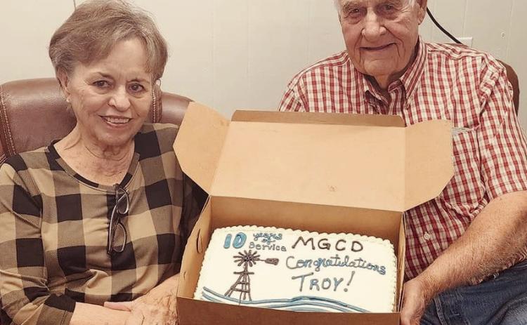 Mesquite Groundwater Conservation District (MGCD) celebrates Troy Thomason’s 10 years of service, with his wife, Kay, at its September board meeting. Hired in 2013, Thomason has checked rain gauges, measured well water levels and recorded flowmeter data. “His knowledge of the county and landowners has truly been invaluable to the district,” said MGCD General Manager Whitney Wiebe. “He has worked to help define and create several of the data collection points across the district.” Courtesy Photo