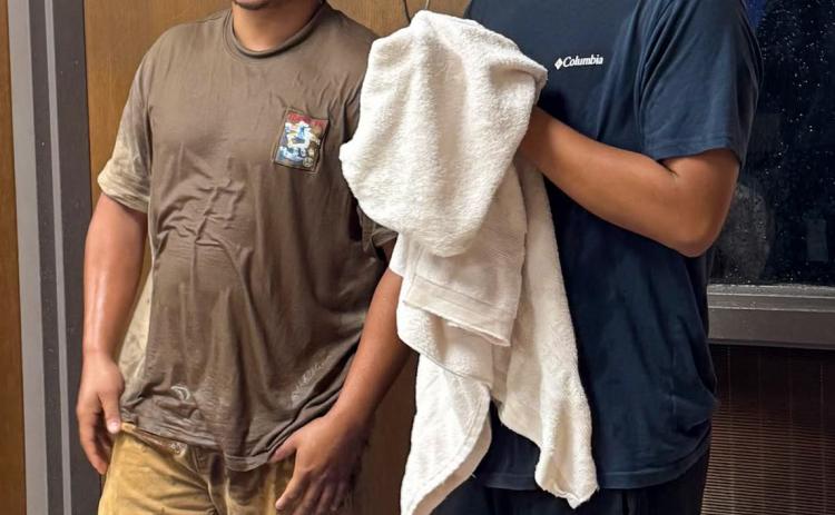 Memphis High School students test the water, pulling the shower in the science lab. MEMPHIS ISD