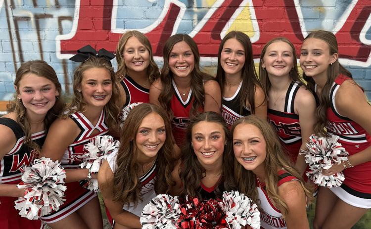Cheering on the Wellington Skyrockets for the 2026-2027 school year are a spirited squad of 10 young women. Front row, from left: junior Tatum Kane, freshman Claire Kane, freshman Kaesyn Kane. Back row, from left: freshman Halle Hedrick, freshman Ava Kate Inman, senior Allie Duncan, senior Ceighley Killian, senior Maggie Tillman, sophomore Hartley Kane, sophomore Libby Chandler. COURTESY PHOTO