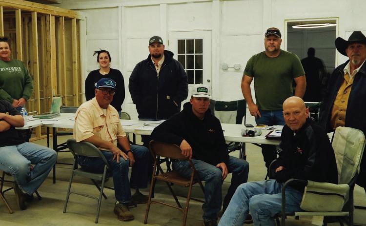 The Wellington Gun Club Board of Directors, including, front row, from left, Matt Needham, Jason Dugan, Vice President Creed Riley, Cliff Waller, and back row, from left, Secretary Carrie Skelton, Treasurer Brook Patterson, Kenny Patterson, President Chad Skelton and Kent Riley, plans for spring shooting events at the Thursday, March 13 meeting. Not pictured: Lauren Patterson. The Red River Sun/Bev Odom
