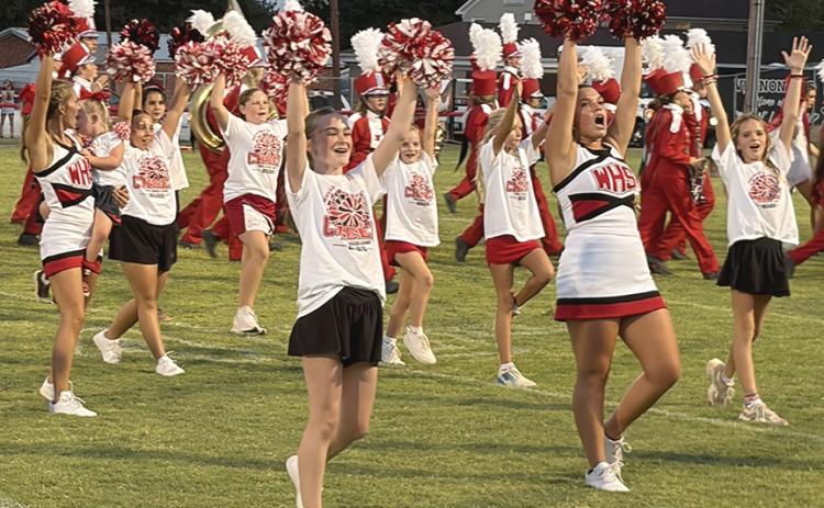 Mini cheerleaders perform at halftime