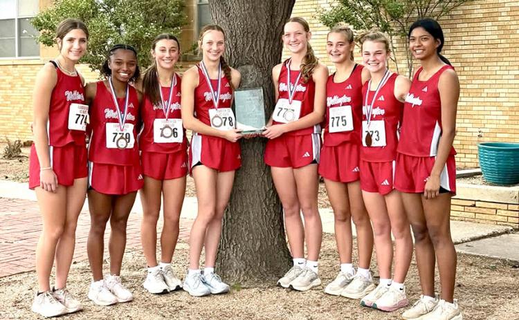 The Wellington Lady Rockets, including Anna Henard, Aleah Lewis, Claire Kane, Taytum Kane, Kaesyn Kane, Ava Kate Inman, Halle Hedrick, and Priscillia Marentes, take the Class 2A Region I preview championship at the recent Lubbock ISD Invitational. WELLINGTON HIGH SCHOOL