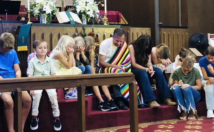 Students, backpacks receive blessing