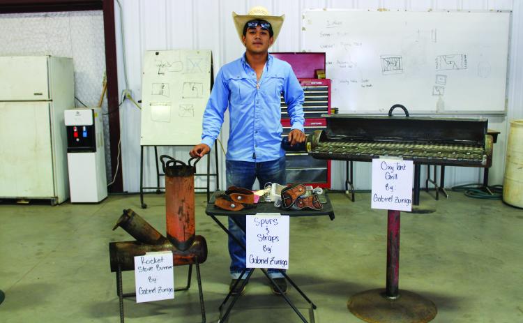 Over 15 Memphis Middle School and Memphis High School students displayed their work at the annual Memphis Independent School District (ISD) Training Center Showcase Wednesday, May 3, including junior Gabriel Zuniga, who presented his rocket stove burner, oxygen tank grill and spurs with straps. Earlier this year, Zuniga placed fourth in his class, as well as received a blue ribbon, with his spurs at the San Antonio Stock Show and Rodeo Agricultural Mechanics Show. The Red River Sun/Elizabeth Tanner