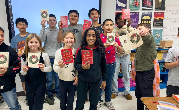 Memphis Middle School sixth- and seventh-grade students send Christmas cards to Memphis Convalescent Center residents. Memphis ISD