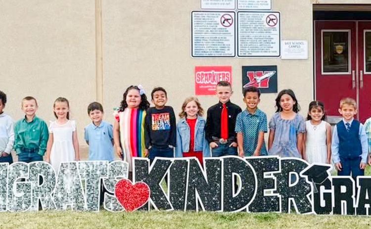 Kacy Cabbell’s Wellington Elementary School kindergarten Sparklers received their diplomas during a Friday, May 1 morning ceremony in the Wellington High School Gymnasium. From left: Amiaya Araiza, Jay Arizpe, Kellyn Conner, Cassius Hargrove, Stetson Kemp, Zella McDaniel, Liam Pyle, Baylee Rodriguez, Prince Roland, Aerin Sims, Mack Tarver, A’Mari Tillman, Peyton Torrez, Emilia Vaught, Hudson Warren, Barrett Weatherly, Ana Soto, Amilya Mitchell, Marty Garcia. WELLINGTON ELEMENTARY SCHOOL