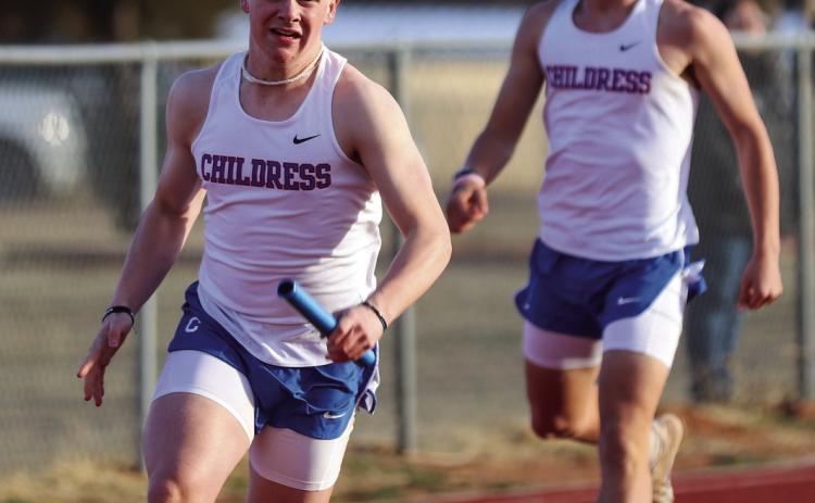 Kasen Geiser competes in the 4x100 meter relay, helping the Bobcats complete a second-place time of 45.81.