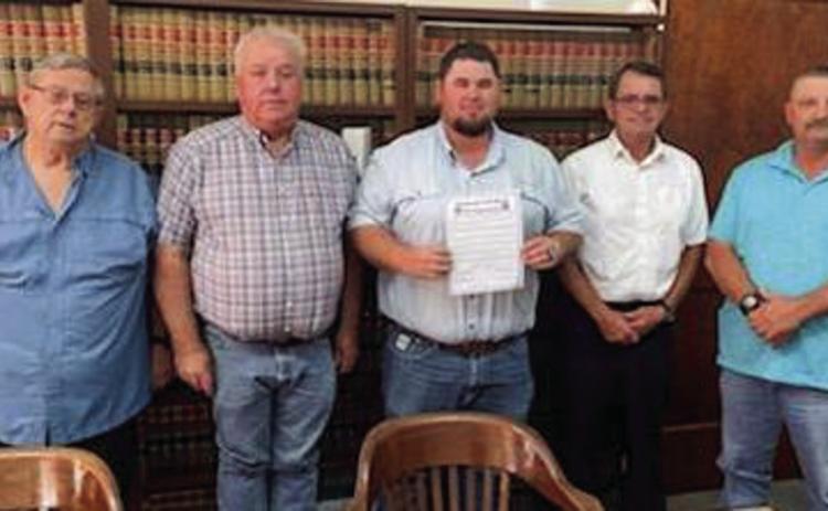 During its October meeting, the Commissioners Court of Collingsworth County signed a proclamation, recognizing the Collingsworth County 4-H program and emphasizing the incredible experiences that 4-H offers youth. From left, County Judge John James, Pct. 3 Commissioner Joel Sherwood, County Agent Kenny Patterson, Pct. 2 Commissioner James “Jim” Ellis, Pct. 1 Commissioner Farris Nation. Courtesy Photo