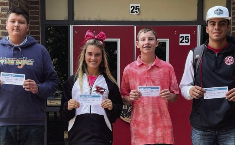 Angel’s Subs &amp; Sweets and Brothers-Sisters of our Military Adventures team up on Fridays to give away a free lunch gift certificate to Wellington High School (WHS) students. The name of every WHS student is put into the drawing. The sixth-round winners include Hayes Carter, left, Maggie Tillman, Carter Ouellette and RJ Granadoz. Photos Courtesy of Wellington High School