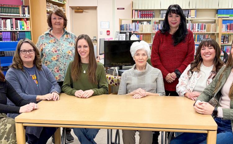 Gathering Thursday morning, Feb. 12, members of Collingsworth Public Library’s Board of Directors are passionate about the services offered by the library. Front row, from left: President Alison Strickland, Vice President Karoline Ashmore, Secretary Molly Sims and Members Linda Powell, Rachae Barlow and Elizabeth Keys. Back row, from left: Librarian Debbie George, Library Aide Cathy Andrewes. Not pictured: Board Member Judy Gurule, Library Aide Susie Klassen. The Red River Sun/Bev Odom