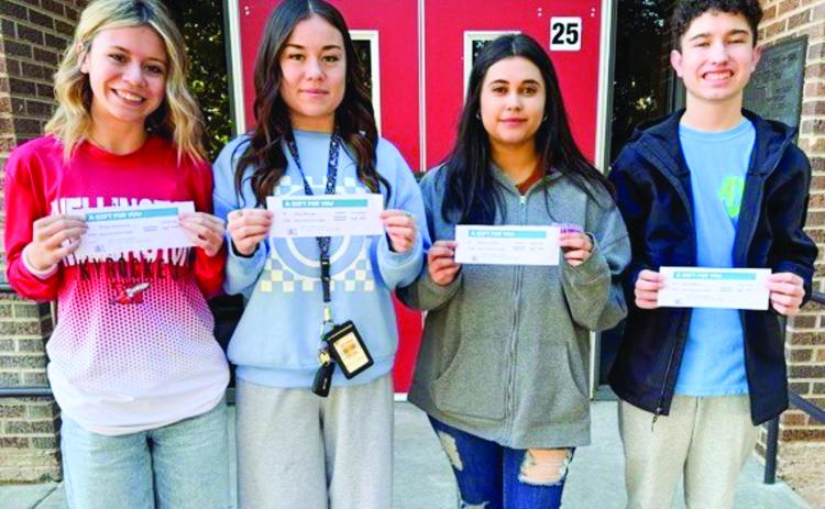 Angels Subs &amp; Sweets and Brothers-Sisters of Our Military Adventures continue to team up to give away a free lunch gift certificate to Wellington High School (WHS) students on Fridays. The name of every WHS student goes into the drawing. Ninth-round winners include Rilynn Southerland, left, Kenzi Ballinger, Isabella Owens and Jaxon Collins. Photos Courtesy of Wellington High School