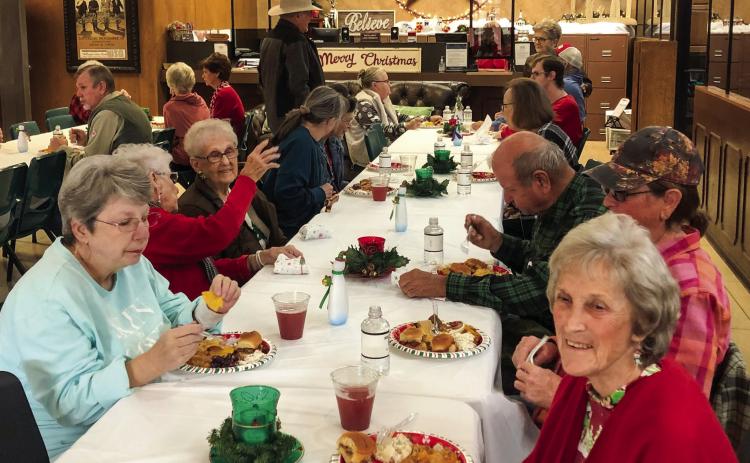 Patrons celebrate the season with Wellington State Bank´s Christmas occasion
