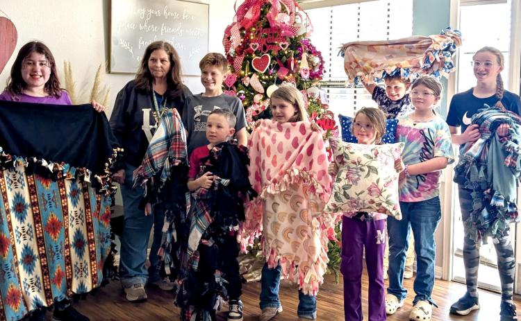 Childress County 4-Hers craft blankets, pillows for local nursing home residents