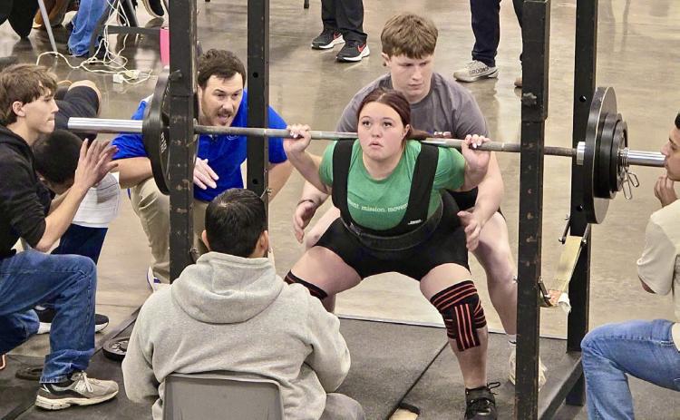 Childress’ Emma Britten competes at the Lockney Invitational Monday, Jan. 19 at the Floyd County Unity Center, opening the 2026 season. Childress Lady Cat and Bobcat Sports