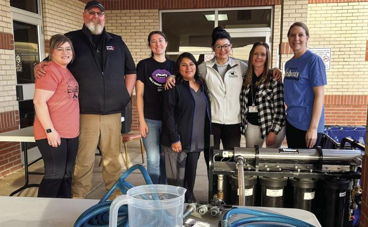 Photo Courtesy of Childress Regional Medical Center Volunteers aid at the Childress Regional Medical Center (CRMC) drinking water station, located in the ER parking lot, Monday, Feb. 27 during the recent water outage, which effected the City of Childress for over 30 hours.