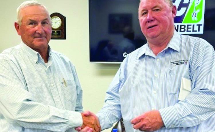 Greenbelt Electric Cooperative Board of Directors Vice President Stan Shelton, left, receives a 25-year pin from Chief Executive Officer Randy White during Greenbelt’s 85th Annual Membership Meeting Friday, Sept. 27 in Wellington. Photos Courtesy of Greenbelt Electric Cooperative