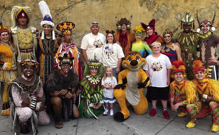 Justin, Natasha, Kaydence and Landry Mixon gather amongst the cast of “The Lion King” at Animal Kingdom Theme Park during their recent Disney World Make-A-Wish Foundation trip to Orlando, Fla. Kaydence served as one of the special guests during the live production of “The Lion King,” where she shined on stage with only a little stage fright. “After the show, we met the dancers and Timon,” Natasha said. “What an incredible experience!” Make-A-Wish Foundation