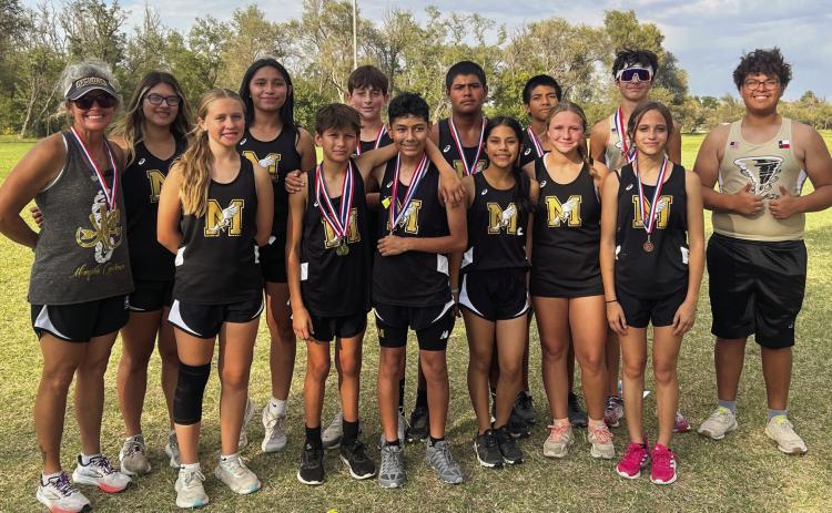 The Memphis Middle School and Memphis High School cross country teams compete at the UIL 2A District Meet Wednesday, Oct. 9 in Wheeler. Back row, from left: Coach Michelle Branigan, Briseyda Cantu, Ariya Garcia, Hutch Ollinger, Evin Zuniga, Demitri Sanchez, Kyler Robison, Nick Perez. Front row, from left: Mylee Robison, Aidan Hoffine, Julian Rodriguez, Mari Soto, Mikayla James, Elizabeth Hoffine. Photos Courtesy of Memphis ISD