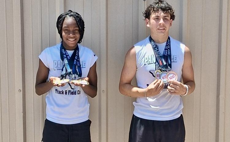Texas Panhandle Track and Field Club’s Aija Johnson and Juno Castillo show off their hardware at the RUN West Texas track and field meet Saturday, June 14 at River Road High School in Amarillo.