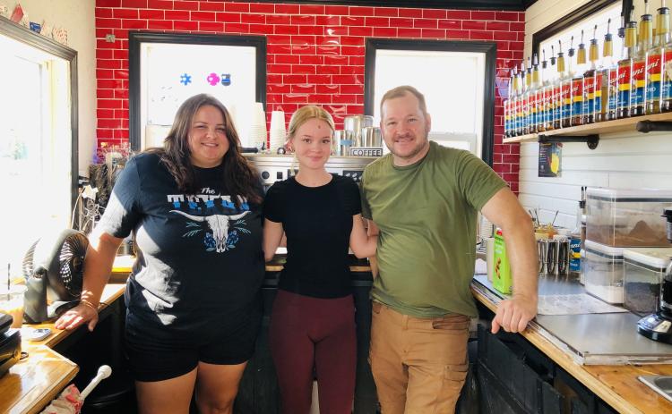 Co-founder Kassidy Barlow, left, barista Alyvia Sorensen and co-founder David Sorensen supervise the Sorensen Wellhouse coffee truck, a.k.a. The Soggy Llama, located at 309 Houston St., just south of Wellington Fairgrounds, on the west side of U.S. Hwy 83. Not pictured: co-founder Kathryne Sorensen.