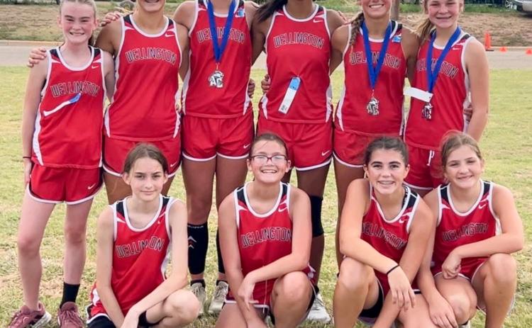 The Wellington Junior High School cross country team competes at the 2025 Badger Run Saturday, Sept. 13 at Amarillo College, medaling three competitors, including Claire Kane, Kaesyn Kane and Halle Hedrick.  Front row, from left: Jessalee Peters, Abbygale Torrez, Quinn Roberson, Evie Henard. Back row, from left: Taytum Martin, Ava Kate Inman, K. Kane, Priscilla Marentes, C. Kane, Hedrick.