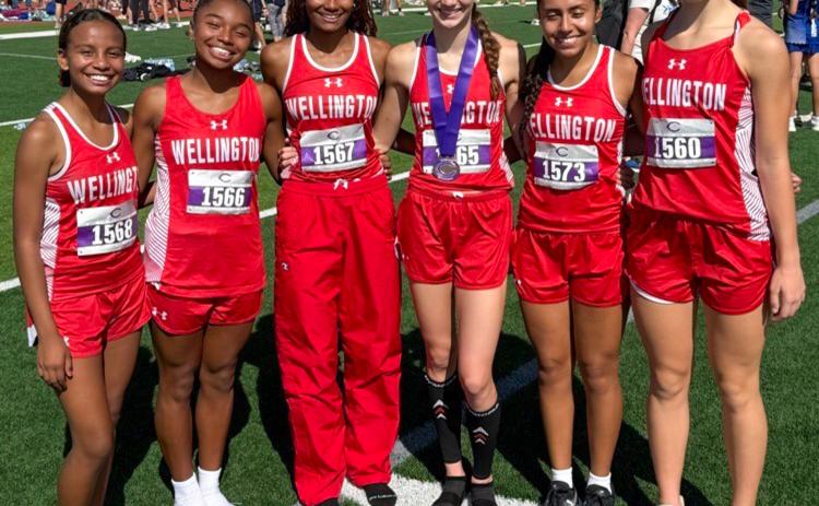 Wellington High School sophomore Taytum Kane continues the Kane family winning tradition, placing ninth in the 1A-4A division Saturday, Sept. 20 at the Canyon Cross Country Invitational at Canyon High School, clocking a personal record of 12:12.96. From left: Kobee Lewis, Aleah Lewis, Angela Lewis, Kane, Sabrina Segovia, Anna Henard.