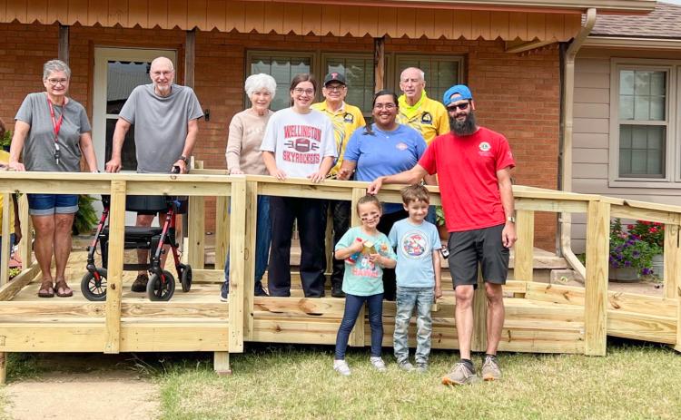 Members of Wellington Lions Club team up with local volunteers, as well as The Texas Ramp Project – Panhandle Area volunteers, of Amarillo, on Saturday morning, Sept. 6 to construct two ramps at Wellington locations.