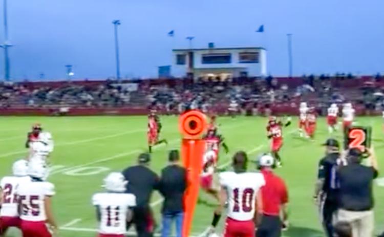 The Wellington Skyrocket offensive line gets into position, while quarterback Callen Kane spots his receiver and completes the pass Friday, Sept. 5 at Bomber Bowl in Frederick, Okla., where the Skyrockets took a 23-13 win, putting together a strong second half.