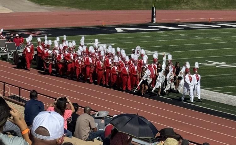 The Rocket Regiment enters the field for its performance at the UIL Region 1 Marching Contest Saturday, Oct. 18 at Dick Bivins Stadium in Amarillo, earning an overall Division 2 rating.