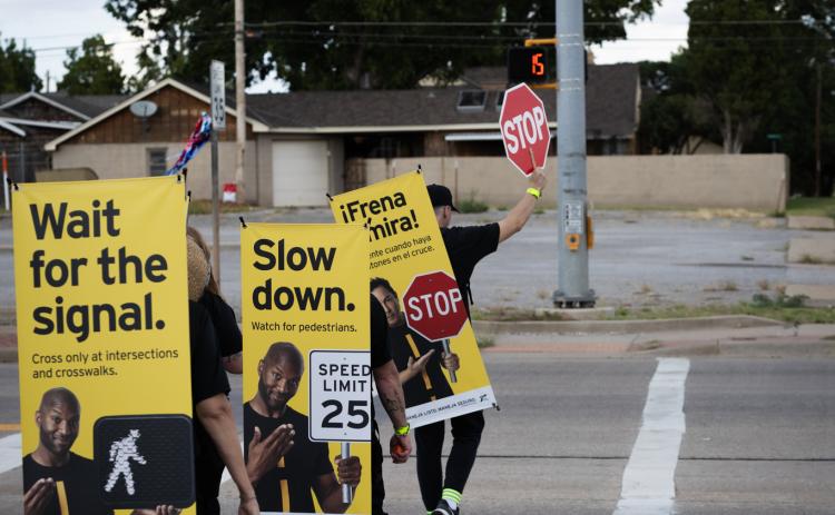 During the deadliest month of the year for pedestrians, the Texas Department of Transportation targets areas of high pedestrian activity and previously reported pedestrian crashes with street teams of “walking billboards,” which display key safety messages for drivers and pedestrians, Monday, Oct. 6 in Childress.