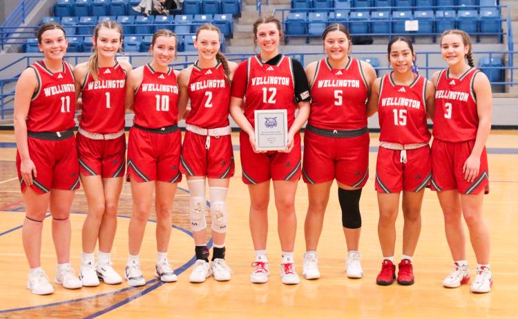 The Wellington Lady Rockets are the 4th Annual Childress Rotary Holiday Invitational Runner-Ups. From left: Ceighley Killian, Kambrie Fisher, Bryn Phillips, Taytum Kane, Brynlee Proffitt, Eryn Torres, Aundrea Garcia, Gannon Guy.